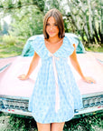 Charlotte Blue Geometric Ruffle Mini Dress with Pink Bow