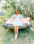 Charlotte Blue Geometric Ruffle Mini Dress with Pink Bow