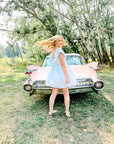 Charlotte Blue Geometric Ruffle Mini Dress with Pink Bow