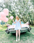 Charlotte Blue Geometric Ruffle Mini Dress with Pink Bow