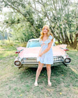 Charlotte Blue Geometric Ruffle Mini Dress with Pink Bow