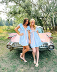 Charlotte Blue Geometric Ruffle Mini Dress with Pink Bow