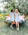 Charlotte Blue Geometric Ruffle Mini Dress with Pink Bow
