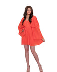 Coral pleated mini dress with long sleeves